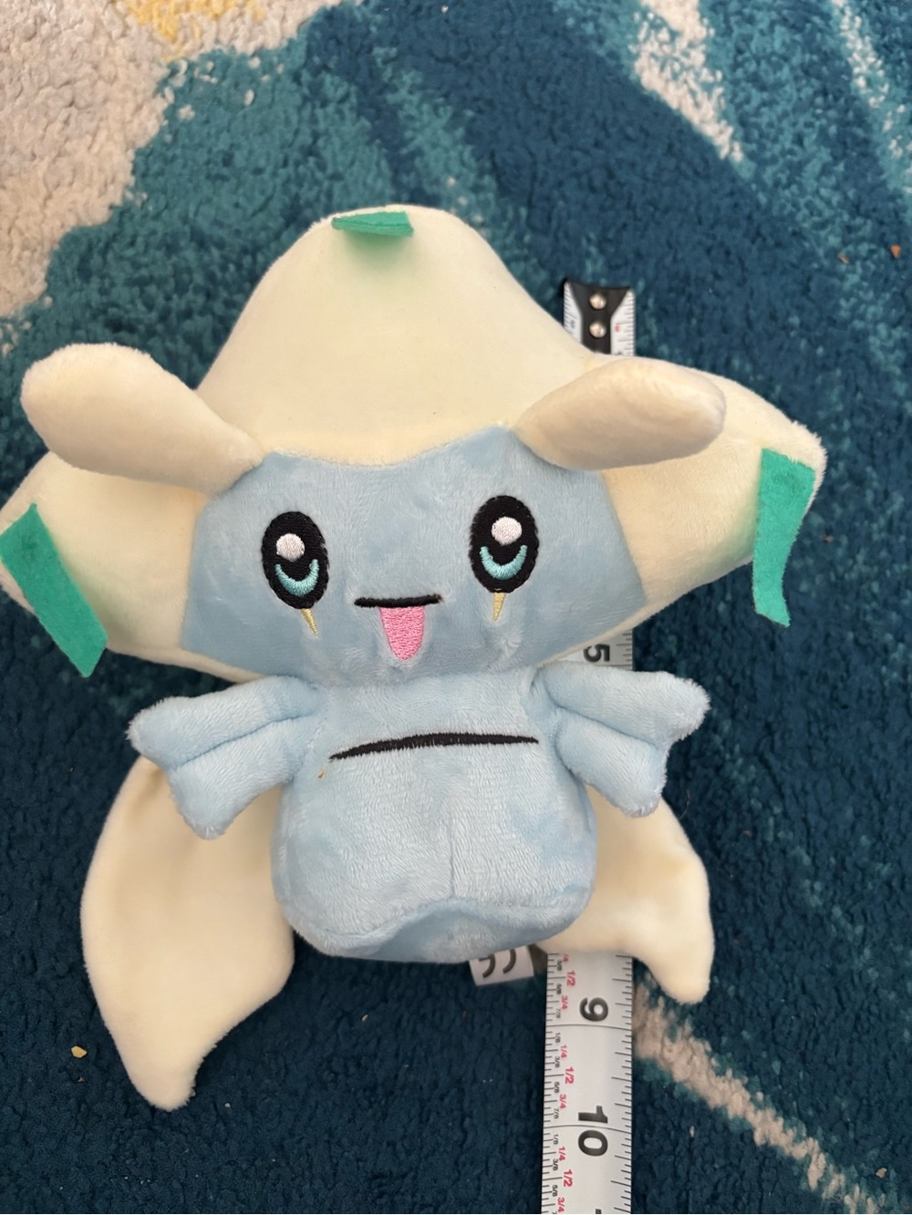 Pokemon Jirachi Plush — Light Blue and Cream with Teal Accents